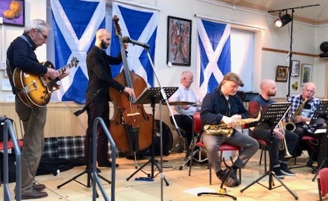 JazzCo played a fine memorial concert of swinging bop composed by their 
much-missed band leader, Richard Burton, who was a covid victim a year ago.